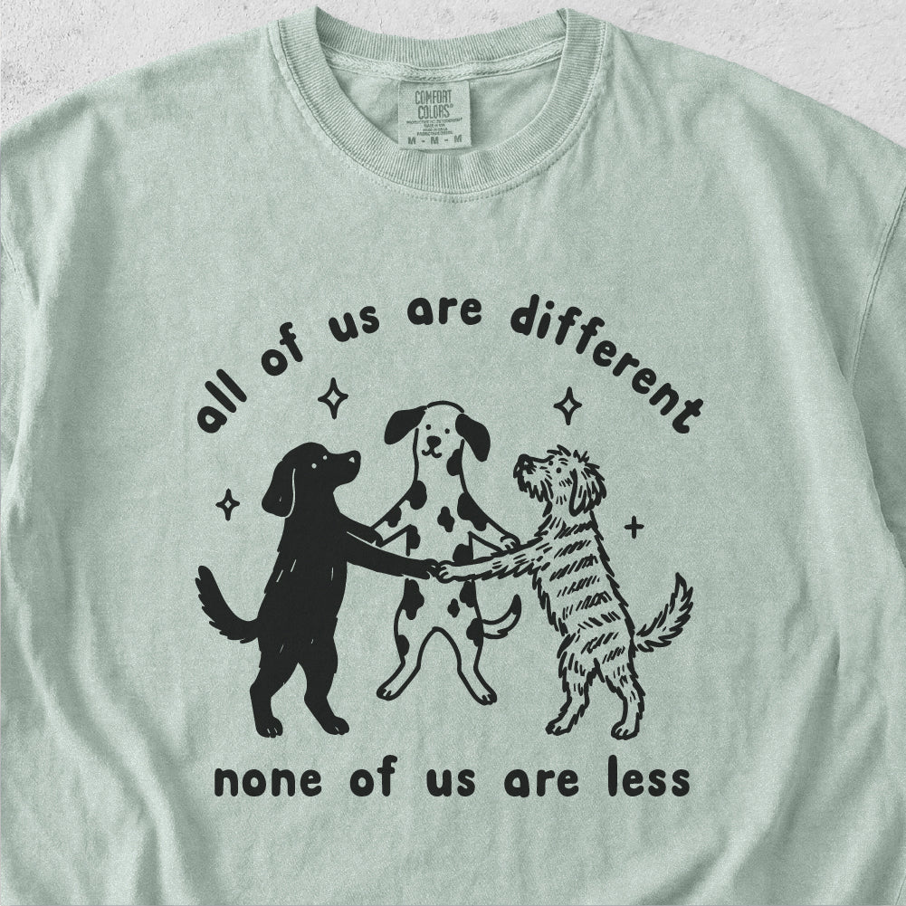 None of Us Are Less Tshirt