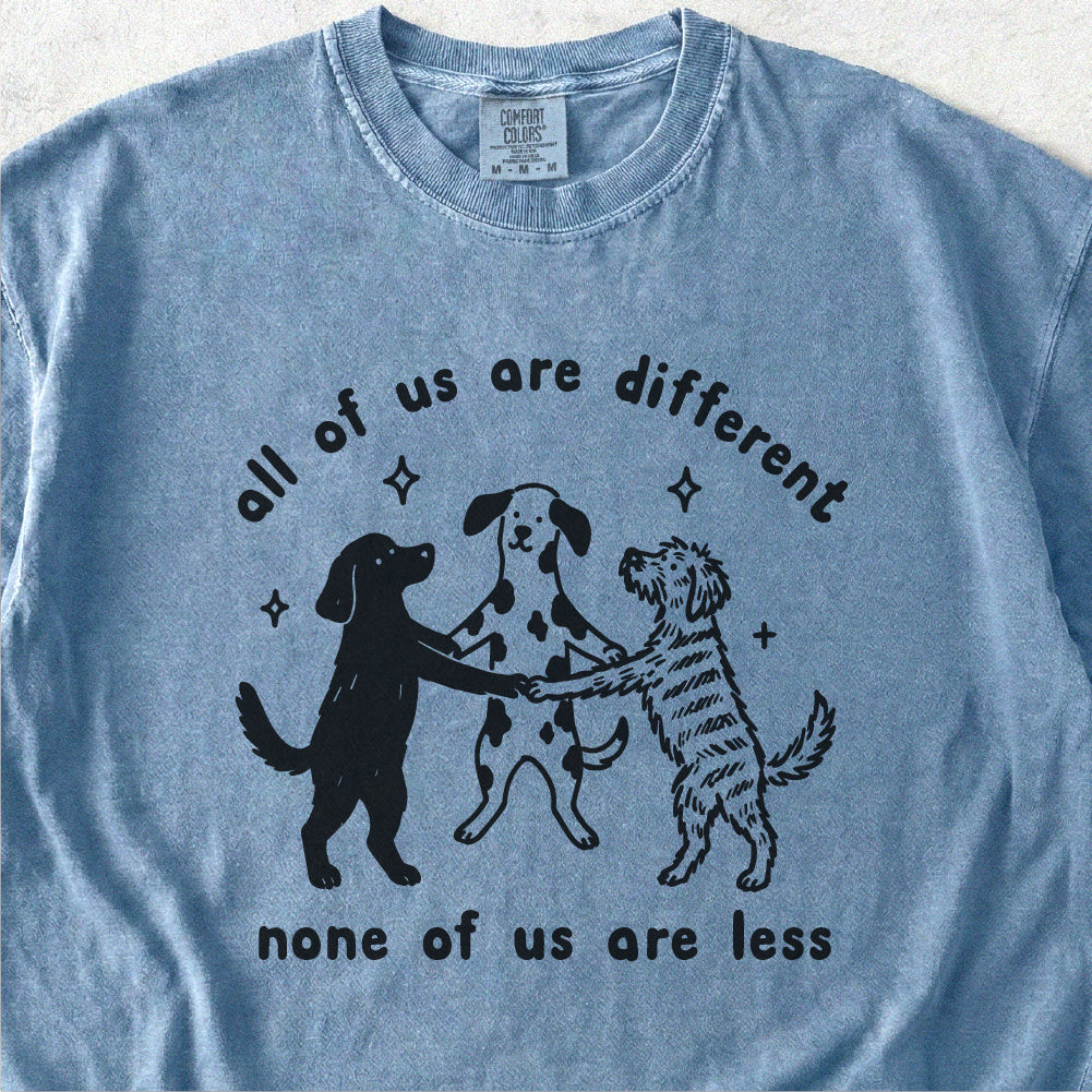 None of Us Are Less Tshirt